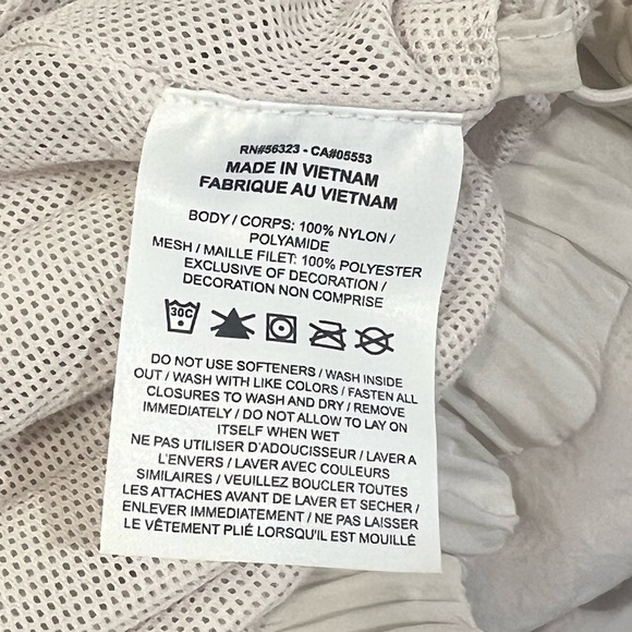 NIKE Essential Wind RunnerJacket Lightweight Oversized Size XL Cream - Picture 8 of 8